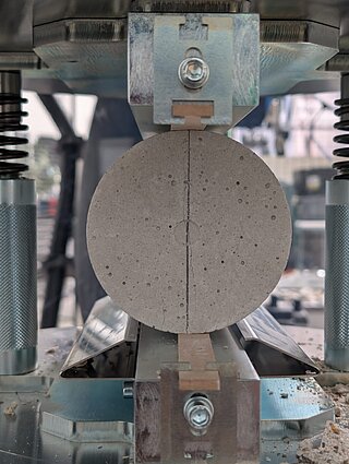 Precast Zero Concrete sample in a testing apparatus