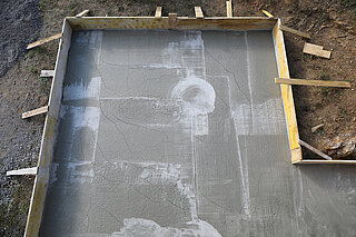 SlideTex Close-up of a floor slab showing visible cracks