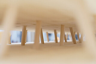 IDSMBKS Wooden rods arranged between flat plates