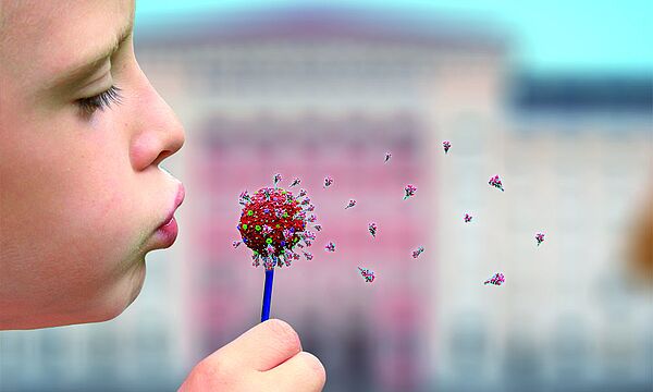 Bildmontage mit Kind, das Spike-Proteine von einem COVID-Virus pustet, als sei es eine Pusteblume